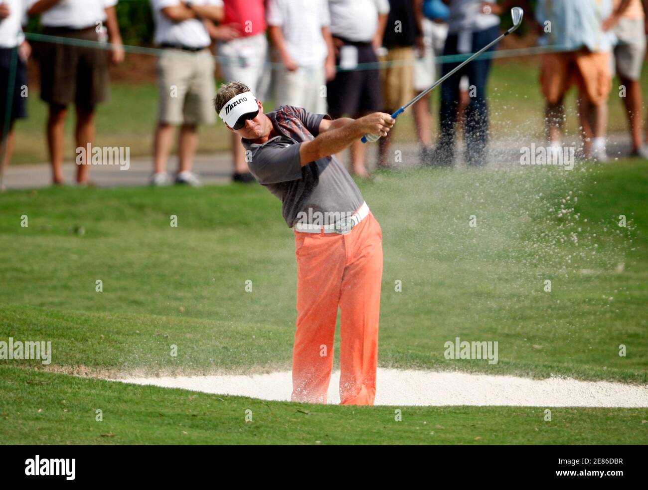 Brian Gay of the U.S. plays his second shot from the fairway bunker on the eighteenth hole during the third round of the St. Jude Classic golf tournament at TPC Southwind in Memphis, Tennessee June 13, 2009.   REUTERS/Nikki Boertman    (UNITED STATES SPORT GOLF) Stock Photo
