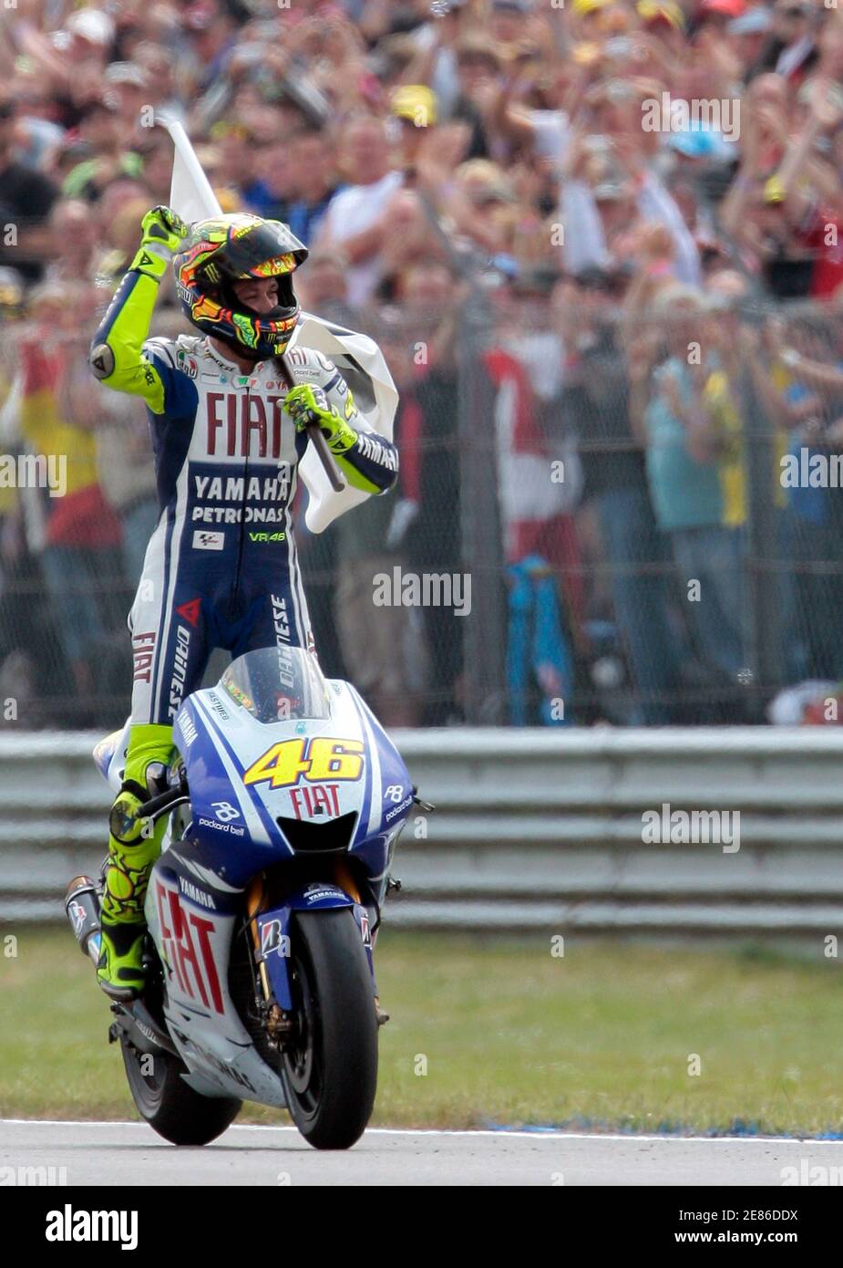 Yamaha MotoGP rider Valentino Rossi of Italy celebrates winning the Dutch  Motorcycling Grand Prix in Assen June 27, 2009. MotoGP world champion Rossi  won his 100th grand prix victory from pole position