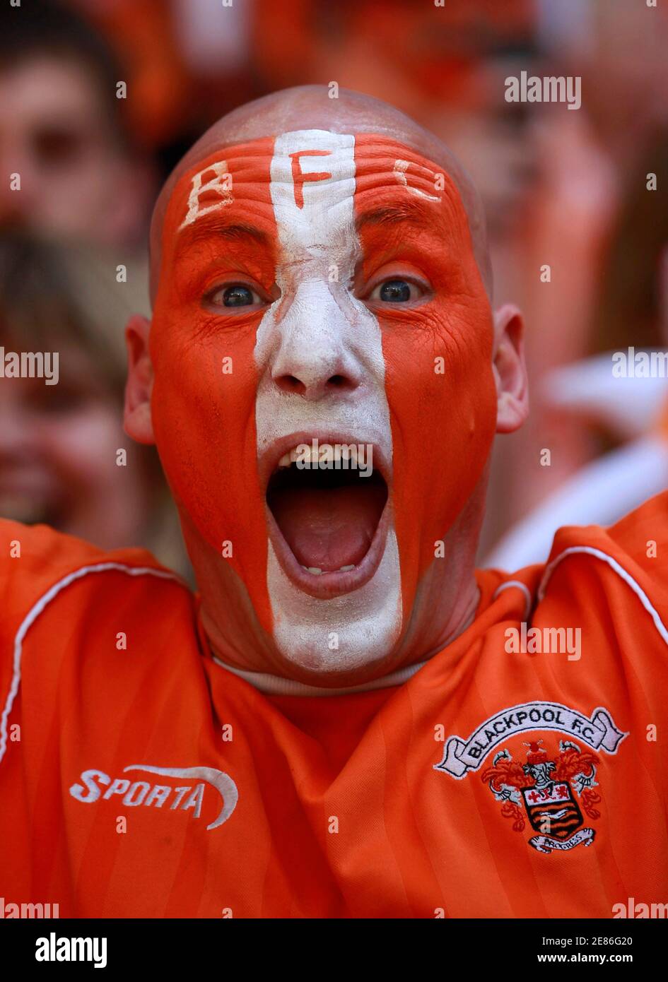 A Blackpool fan celebrates after their English Championship play-off final soccer match victory over Cardiff City at Wembley Stadium in London May 22, 2010. REUTERS/Eddie Keogh  (BRITAIN-Tags: - Tags: SPORT SOCCER) Stock Photo