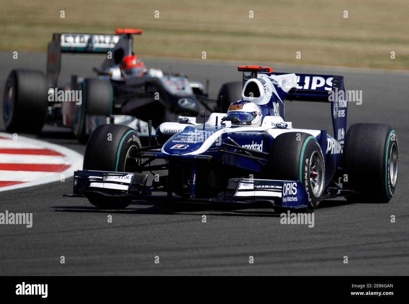 Williams Formula One driver Rubens Barrichello of Brazil leads Mercedes  Michael Schumacher of Germany during the