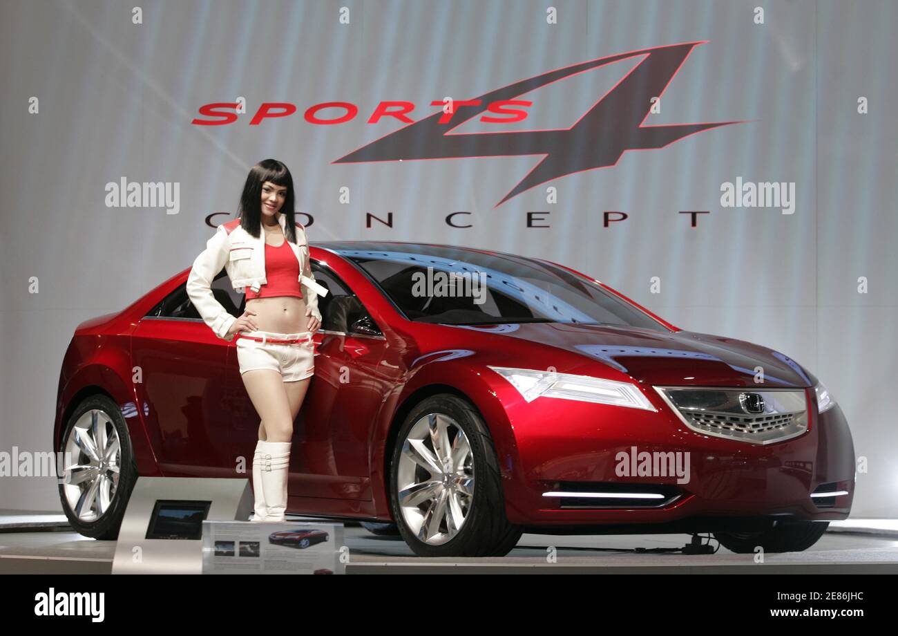 A Model Poses With Honda S Sports 4 Concept Car At Kuala Lumpur International Motorshow 2006 In Kuala Lumpur May 25 2006 The 10 Day Show Displays Latest Offerings From Auto Makers Such As