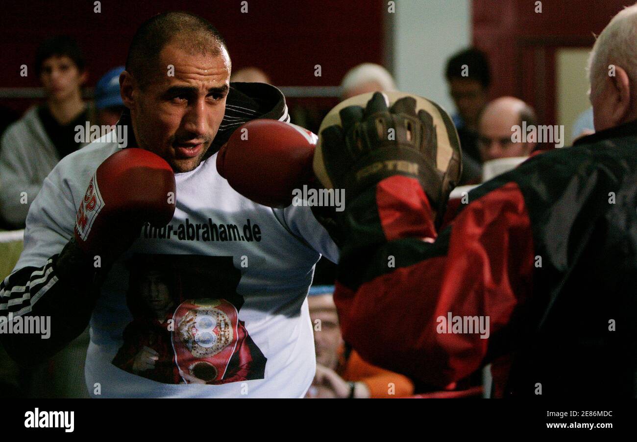 Defending International Boxing Federation (IBF) middleweight World champion  Arthur Abraham (L) of Germany beats against his coach Ulli Wegner during a  training session in Basel December 3, 2007. Arthur Abraham will face