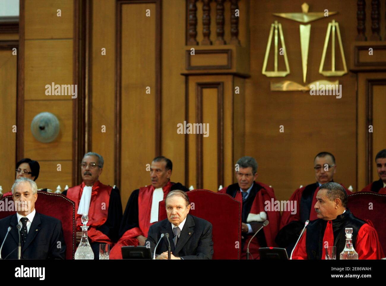 Algeria's President  Abdelaziz Bouteflika (C) gives a speech during opening the ceremony of judiciary year at supreme court in Algiers October 29, 2008. President Abdelaziz Bouteflika, reaching the end of his second and final term, said on Wednesday he wanted to alter Algeria's constitution in a manner several analysts interpreted as meaning he intends to stay on. REUTERS/Louafi Larbi (ALGERIA) Stock Photo