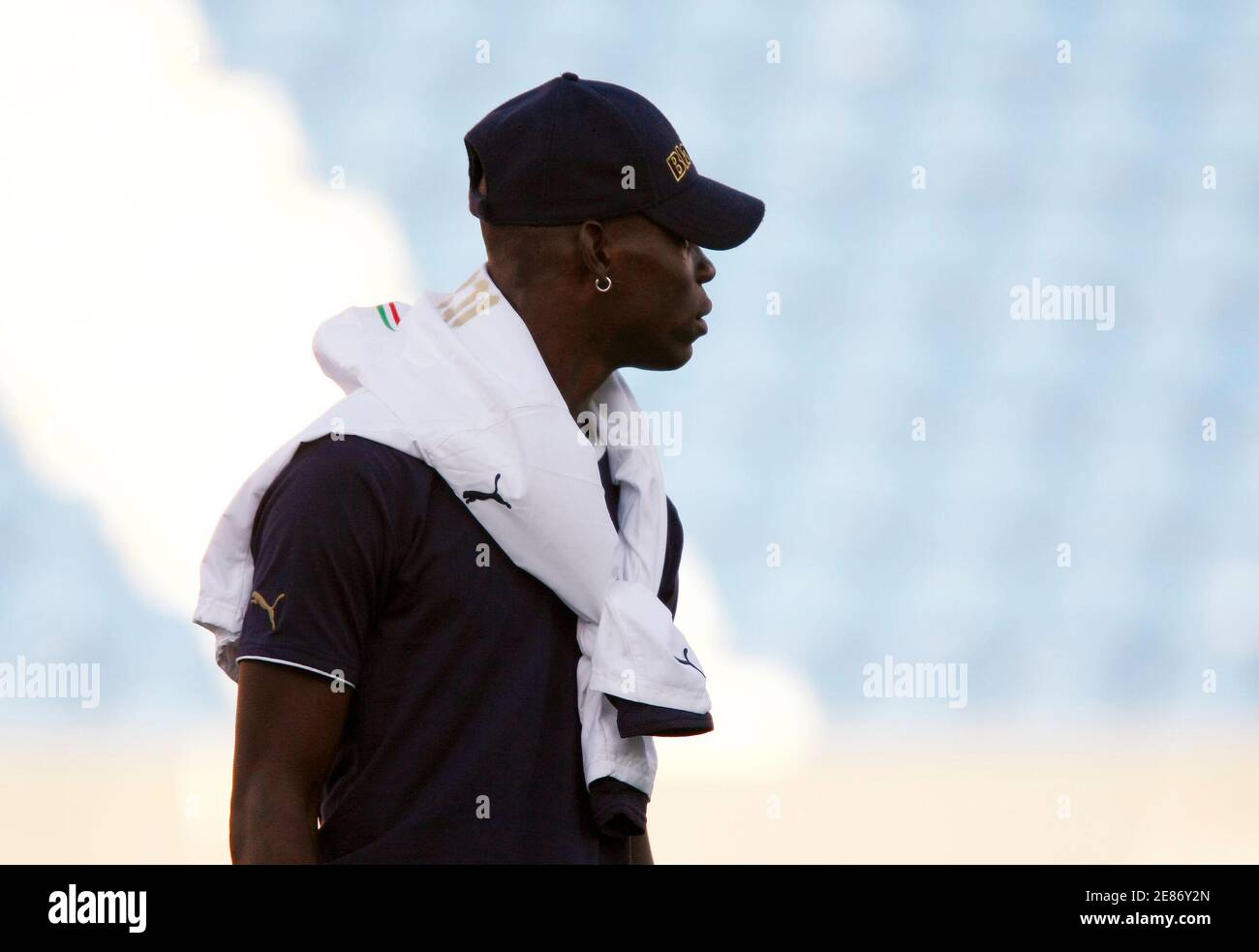 Italy's Mario Balotelli stands on the pitch before their European U21  Championship soccer match against Belarus at Olympia stadium in Helsingborg  June 23, 2009. Balotelli will not play due to a red