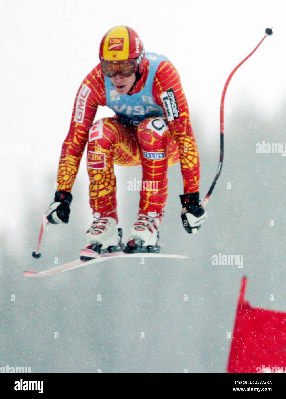 Canadian Erik Guay flies over the last jump on the Birds of Prey course to place sixth in the men's World Cup downhill in Beaver Creek, Colorado December 2, 2005 with a time of one minute 14.46 seconds. Daron Rahlves of the U.S. was first, team mate Bode Miller took second place and Austrian Hans Grugger placed third. REUTERS/Rick Wilking Stock Photo