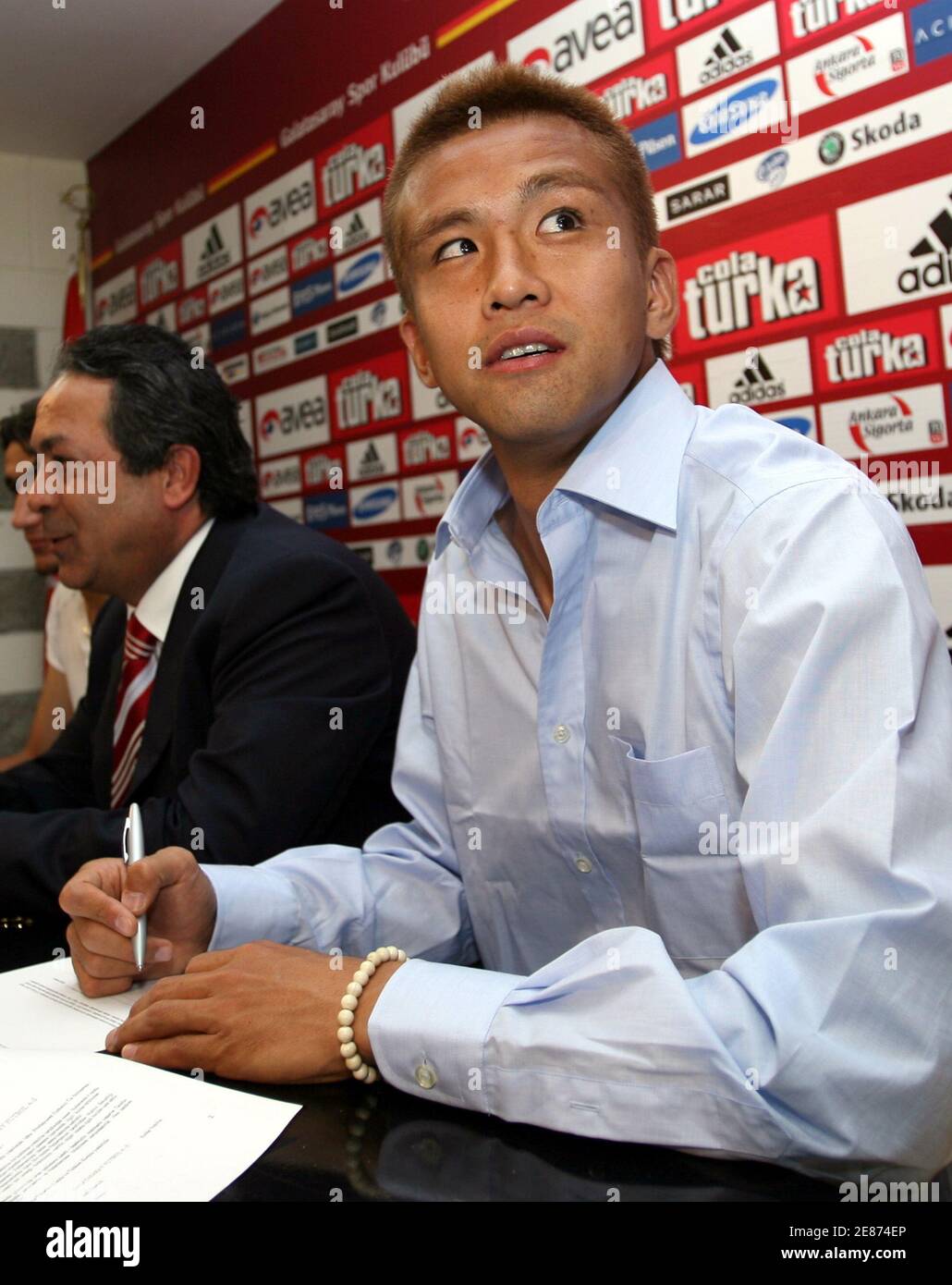 Junichi Inamoto Of Japan Signs A One Year Contract With Turkish Soccer Champions Galatasaray As Sits Next To Club Official Adnan Sezgin In Istanbul September 1 06 Inamoto A Former West Bromwich Albion Junichi Inamoto Of Japan Signs A One Year Contract With Turkish Soccer Champions Galatasaray As Sits Next To Club Official Adnan Sezgin In Istanbul September 1 06 Inamoto A Former West Bromwich Albion