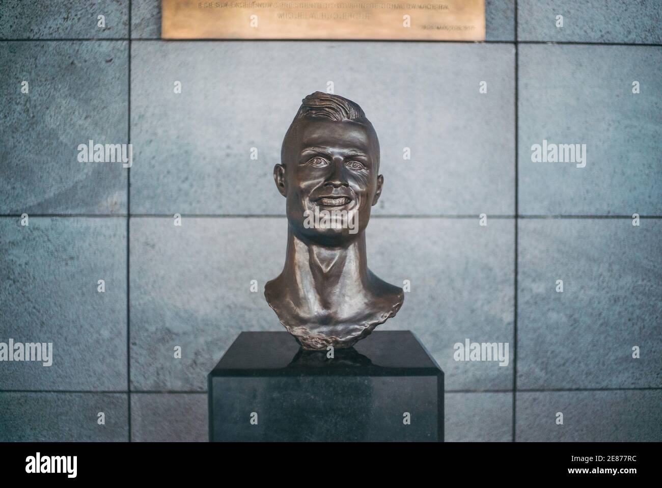 A bronze bust of footballer Cristiano Ronaldo at Madeira Airport in 2018. The sculpture achieved viral infamy for its odd resemblance to the star Stock Photo