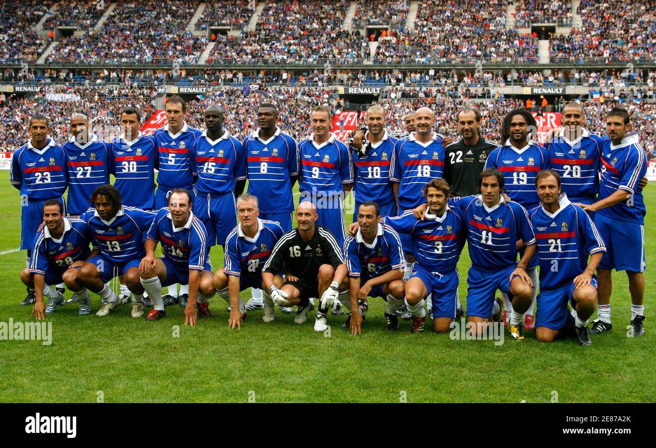 France's 1998 World Cup Champions pose before an exhibition soccer match  against a selection of players from the rest of the world, to celebrate the  10th anniversary of France's World Champion title