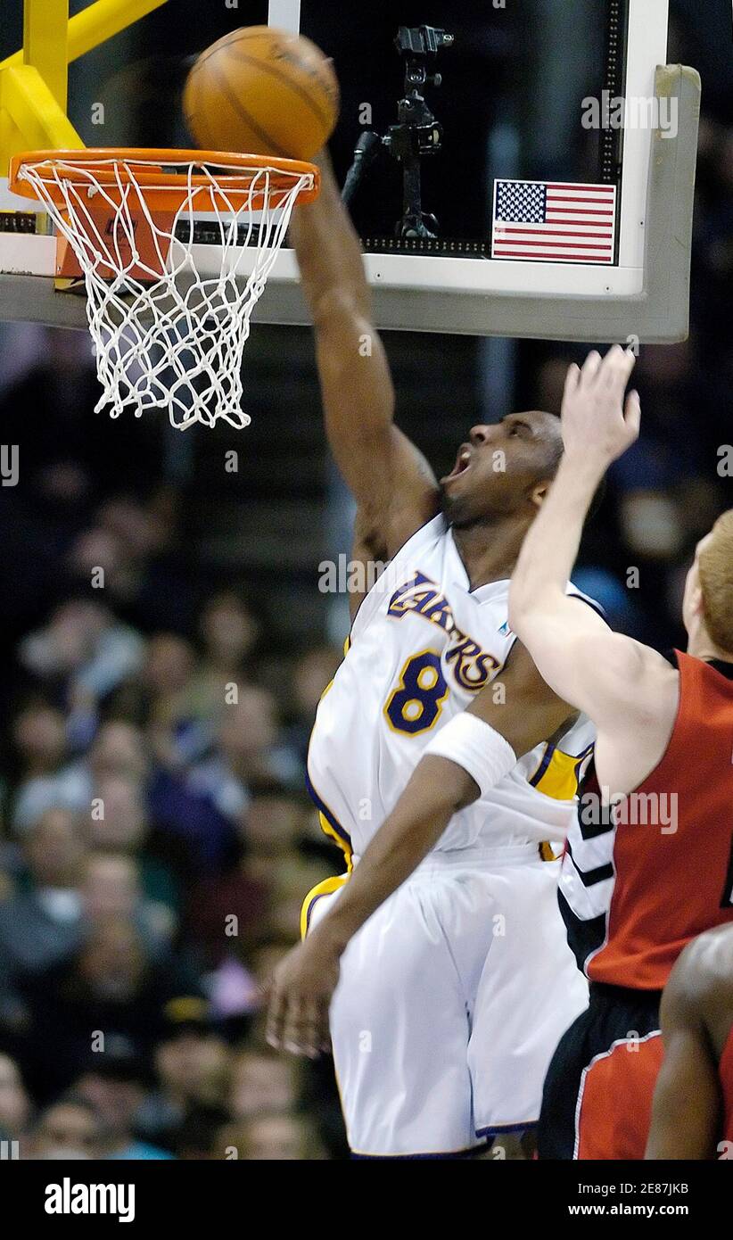 Los Angeles Lakers' Kobe Bryant dunks during the first half of their NBA  game against the Toronto Raptors in Los Angeles January 22, 2006. Bryant  scored 81 points to set a personal