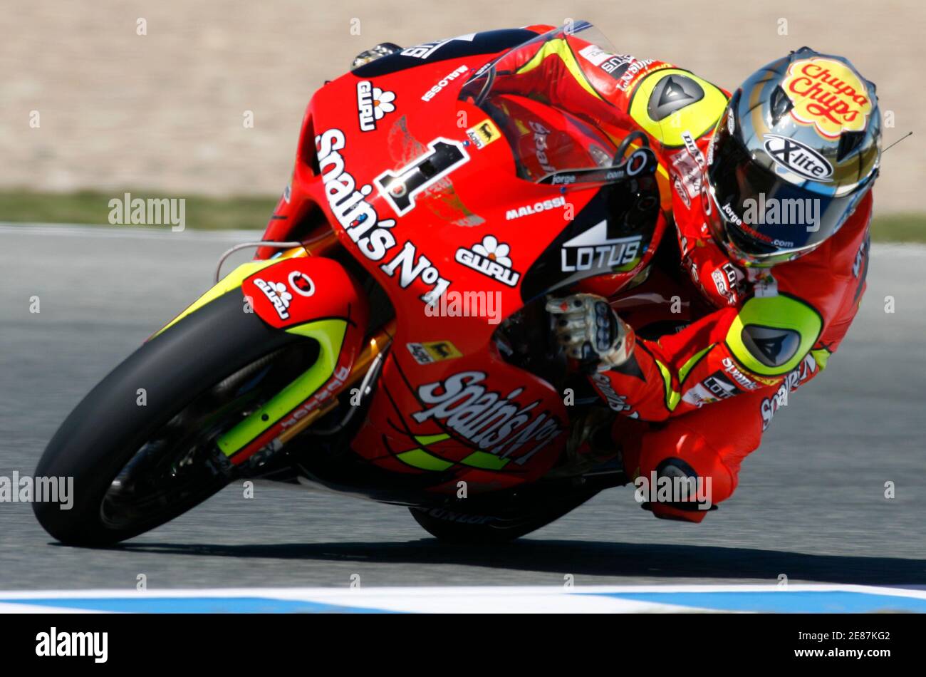 Aprilia team 250cc rider Jorge Lorenzo of Spain takes a curve during the  first free practice session of the Spanish Grand Prix in Jerez March 23,  2007. REUTERS/Anton Meres (SPAIN Stock Photo -