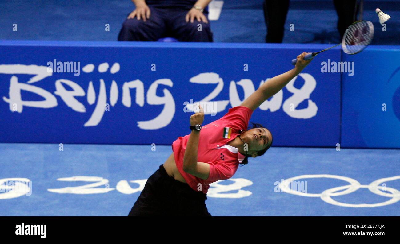 Saina Nehwal of India returns a shot during her women's singles round of 16 badminton match against Wang Chen of Hong Kong at the Beijing 2008 Olympic Games, August 11, 2008.     REUTERS/Beawiharta (CHINA) Stock Photo