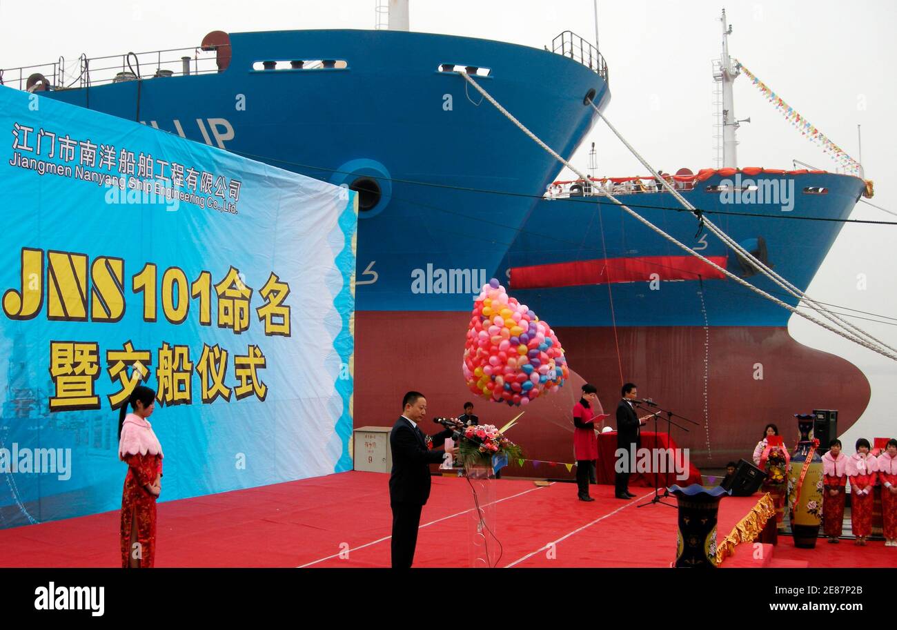 The naming ceremony of bulk carrier Silver Lake (R) built for Pacific Basin by Jiangmen Nanyang Ship Engineering Co. Ltd is held in China's southern city of Jiangmen January 28, 2008. Jiangmen Nanyang Ship Engineering Co Ltd, a privately owned shipbuilder that arose from a shrimp and fish farm in southern China 2-½ years ago, hopes to float shares in Hong Kong, Singapore or Shanghai within three years. The shipbuilder, based in the city of Jiangmen in affluent Guangdong province, aims to grab a 10th of the global handysize ship market by 2011 and is now on the prowl for strategic pre-IPO inves Stock Photo