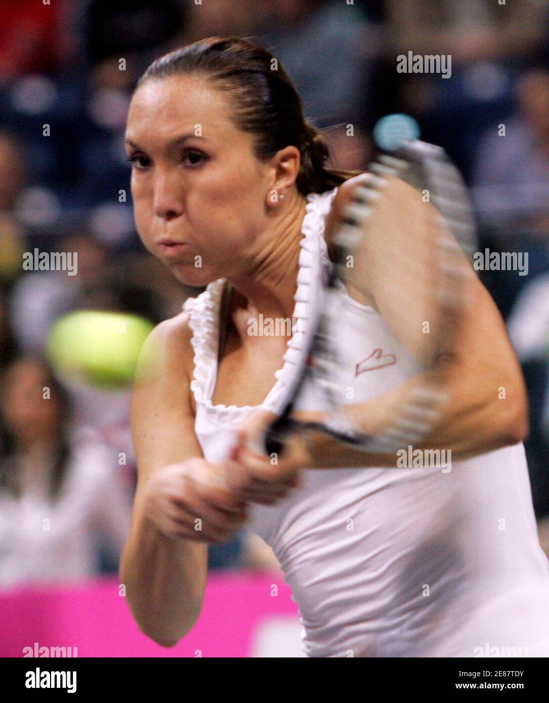 Serbia's Jelena Jankovic returns to Japan's Ai Sugiyama during their match at the Fed Cup World Group II, 1st Round tennis tournament in Belgrade February 8, 2009.   REUTERS/Ivan Milutinovic(SERBIA) Stock Photo