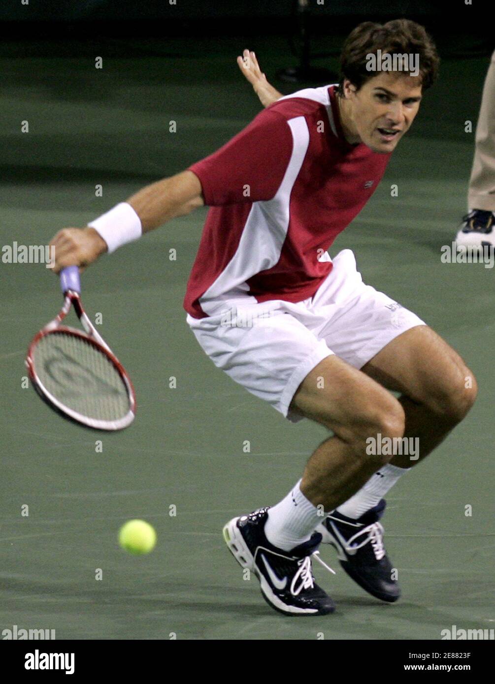 Andre Agassi of the U.S. hits a backhand during a practice session in  Melbourne January 13, 2004. Agassi, speaking during a media conference,  claimed that tennis was leading the way in the