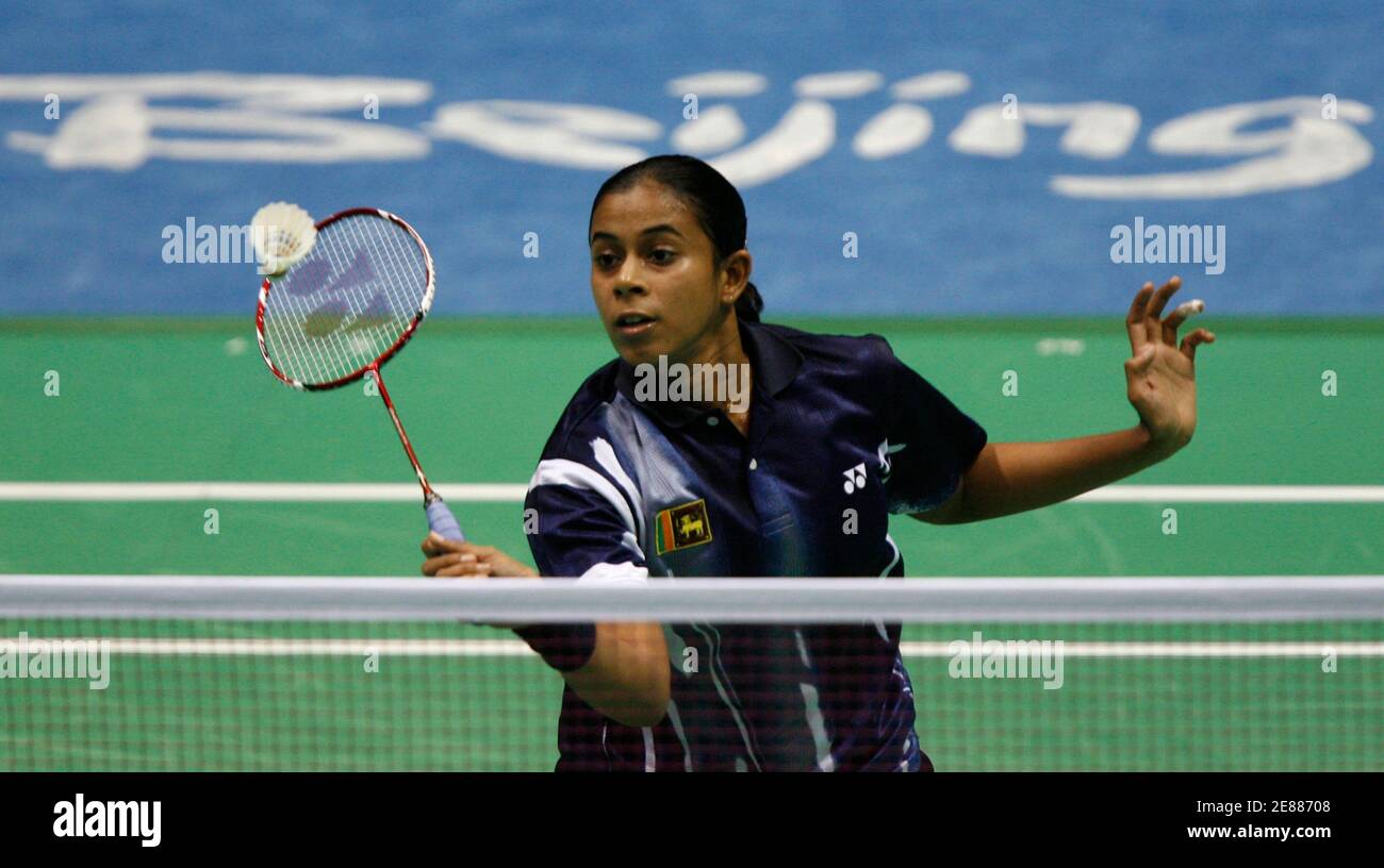 Thilini Jayasinghe of Sri Lanka hits a return to Le Ngoc Nguyen Nhung of  Vietnam during their women's singles first round badminton match at the  Beijing 2008 Olympic Games August 9, 2008.