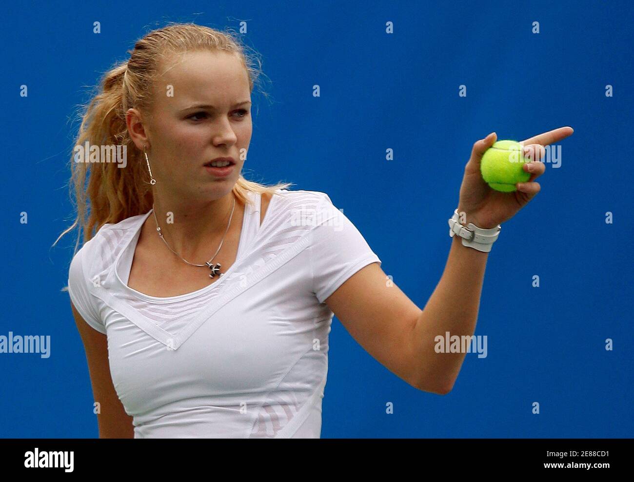 Caroline Wozniacki of Denmark react during a practice session for the upcoming Tennis Classic in Hong Kong January 5, 2010. The tournament will be played from January 6 to 9. REUTERS/Tyrone Siu    (CHINA - Tags: SPORT TENNIS) Stock Photo