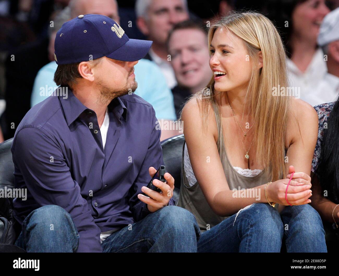 Tien nietig Weggooien Actor Leonardo DiCaprio sits court side with his girlfriend, Israeli model  Bar Refaeli as the Los Angeles Lakers play the Oklahoma Thunder during Game  5 of their NBA Western Conference playoff series
