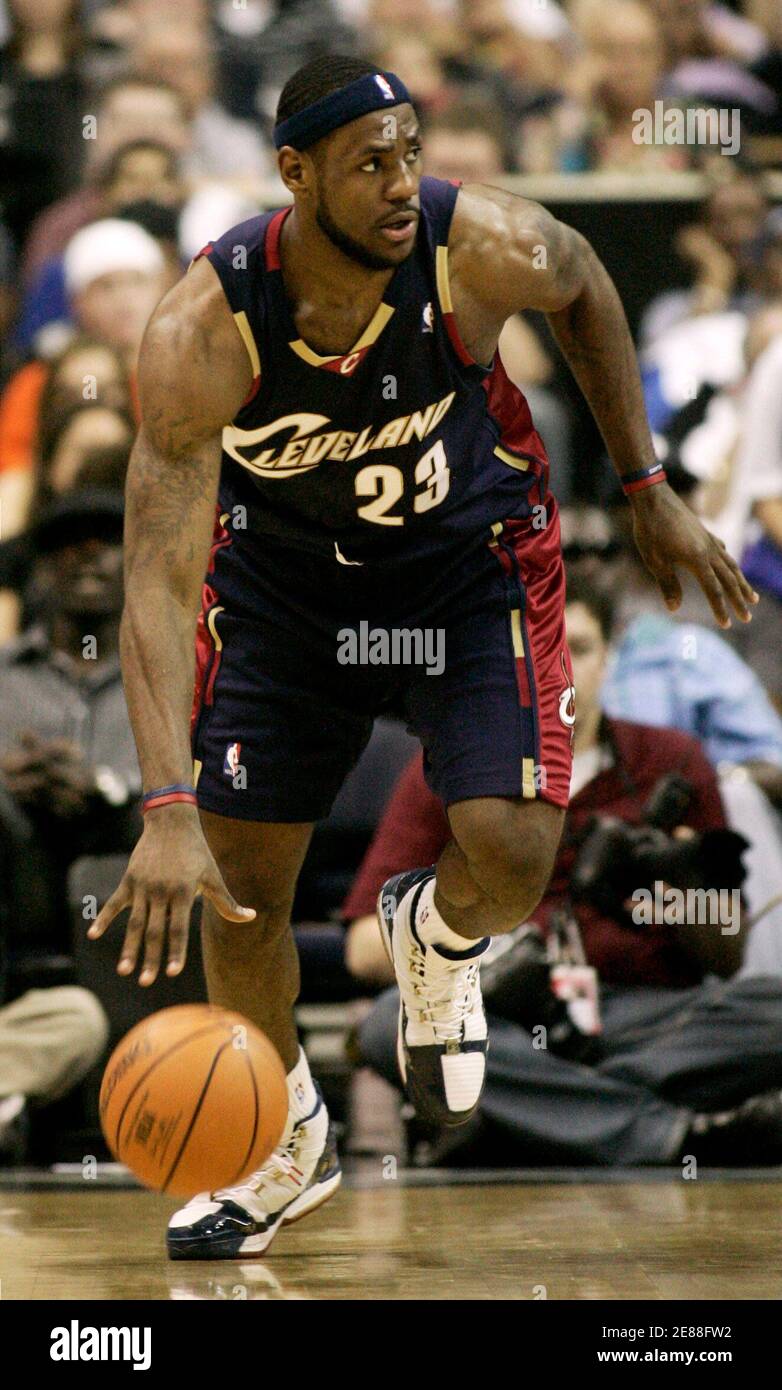 Cleveland Cavaliers' LeBron James scans the court as he starts a fast break against the Washington Wizards during their NBA playoff game in Washington May 5, 2006. Cleveland won the game, 114-113, to eliminate Washington from the NBA playoffs.     REUTERS/Gary Cameron Stock Photo