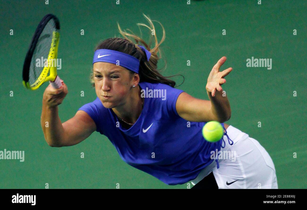 Victoria Azarenka of Belarus returns a shot to Gisela Dulko of Argentina during their match in the second day of the Tennis Classic in Hong Kong January 7, 2010.  REUTERS/Tyrone Siu    (CHINA - Tags: SPORT TENNIS) Stock Photo