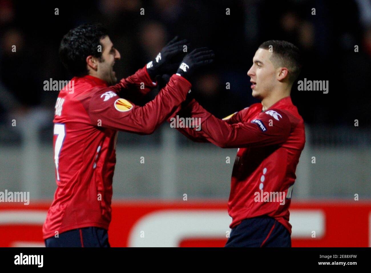 Lille S Pierre Alain Frau L Celebrates With Team Mate Eden Hazard After Scoring His Goal During