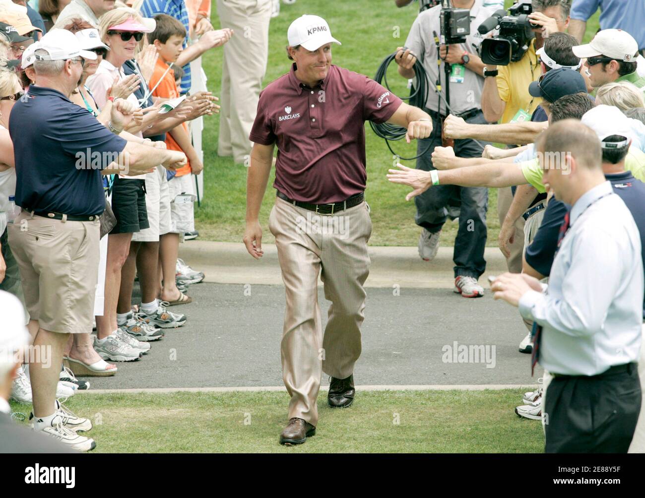 Phil Mickelson of the United States walks to the first tee before his third round of the Quail Hollow Championship in Charlotte, North Carolina May 1, 2010. REUTERS/Jason Miczek (UNITED STATES - Tags: SPORT GOLF) Stock Photo