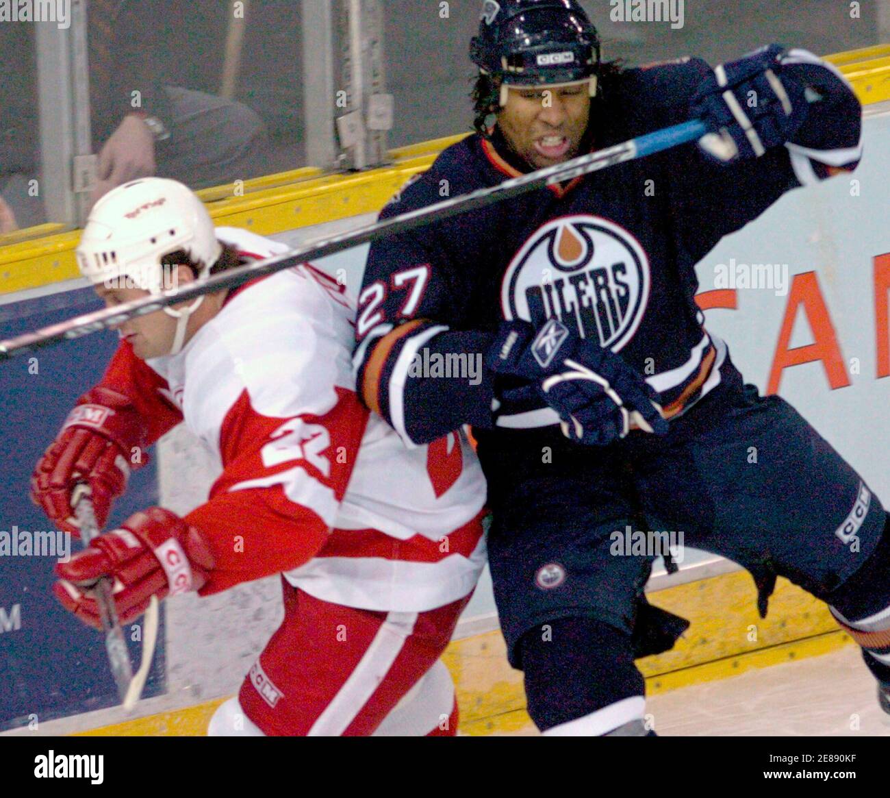 Edmonton Oilers Forward Georges Laraque R And Detroit Red Wings Defenceman Brett Lebda Collide During First Period Nhl Action In Edmonton November 17 2005 Reuters Dan Riedlhuber Stock Photo Alamy