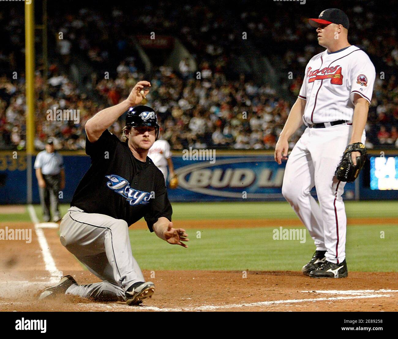 Toronto Blue Jays Runner Gregg Zaun L Scores On A Wild Pitch By Atlanta Braves Relief Pitcher Chad Paronto In The Eighth Inning During Their Mlb Interleague Baseball Game In Atlanta Georgia Toronto Blue Jays Runner Gregg Zaun L Scores On A Wild Pitch By Atlanta Braves Relief Pitcher Chad Paronto In The Eighth Inning During Their Mlb Interleague Baseball Game In Atlanta Georgia