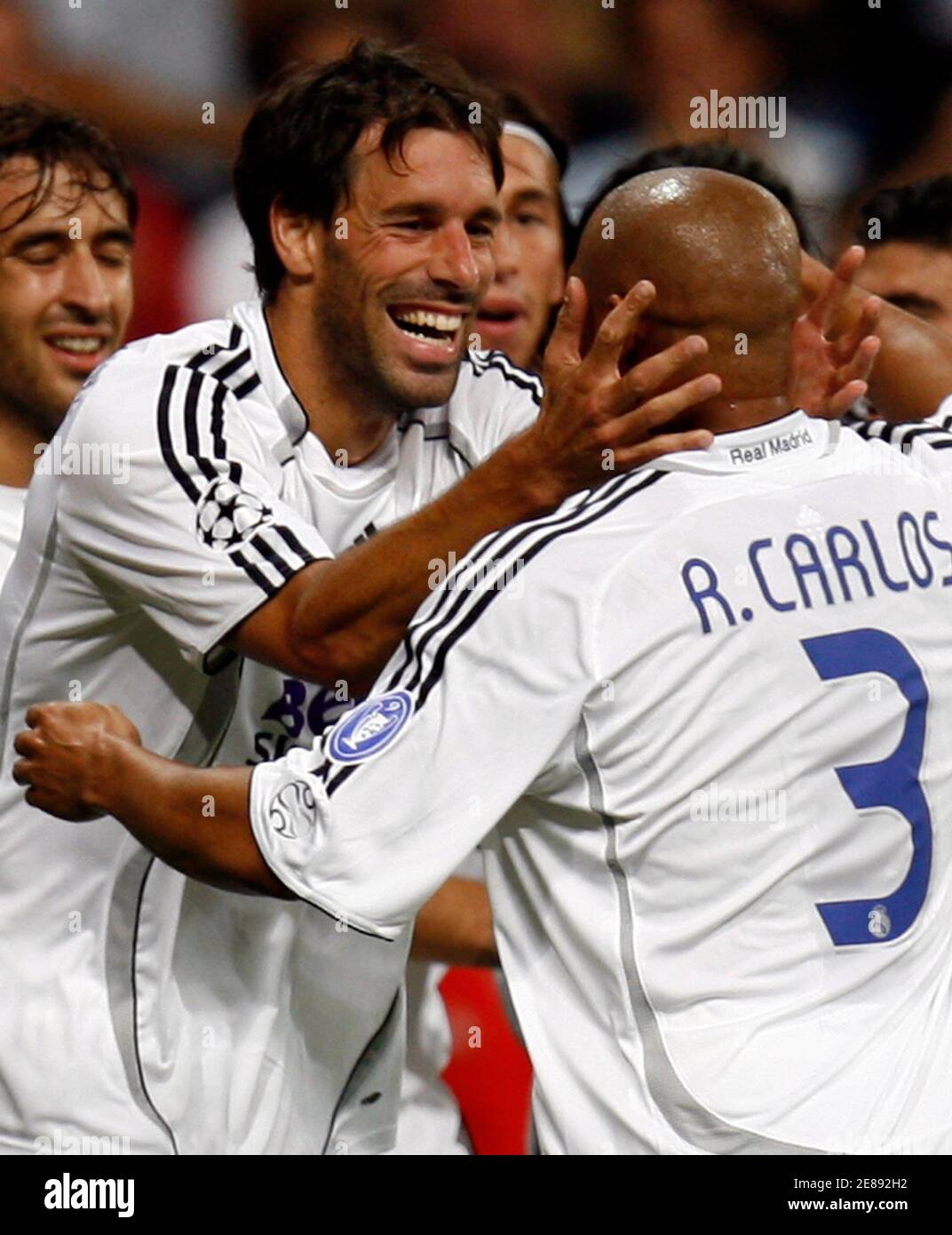 Real Madrid S Ruud Van Nistelrooy L Celebrates With Team Mate Roberto Carlos Of Brazil After Scoring A Goal Against Dynamo Kiev S Oleh Gusev During Their Uefa Champions League Group E Soccer Match Real Madrid S Ruud Van Nistelrooy L Celebrates With Team Mate Roberto Carlos Of Brazil After Scoring A Goal Against Dynamo Kiev S Oleh Gusev During Their Uefa Champions League Group E Soccer Match