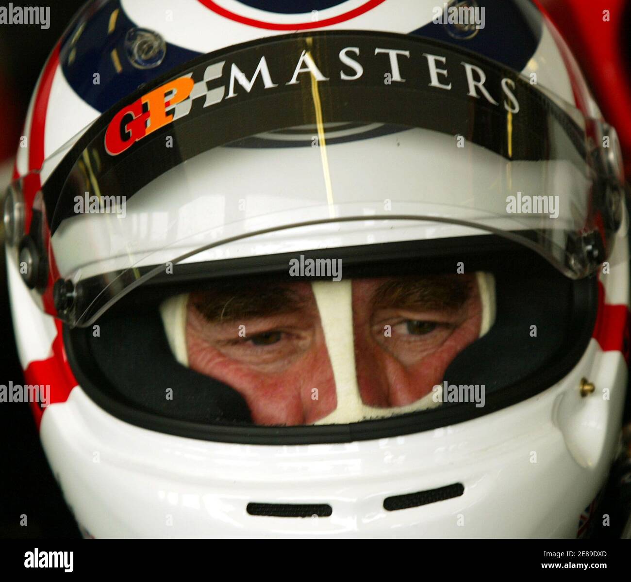 Britain's Nigel Mansell rides his Altech F-1 car during their free practice session in Kyalami north of Johannesburg November 11, 2005. The Grand Prix race takes place on Sunday. REUTERS Juda Ngwenya Stock Photo
