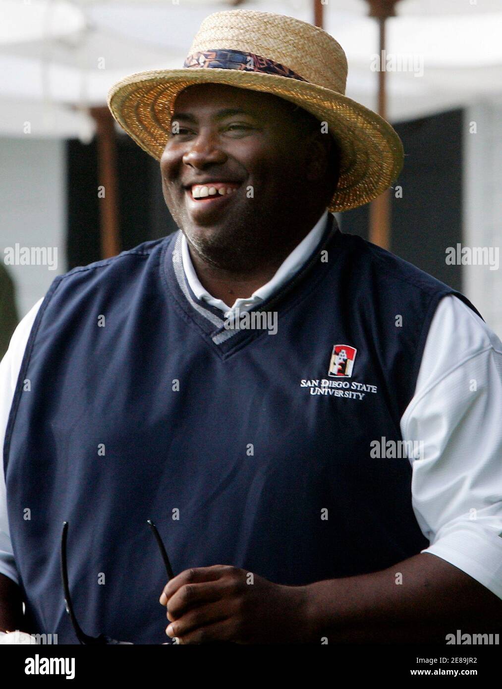 Former San Diego Padre Tony Gwynn smiles as he waits to tee off during the National Baseball Hall of Fame golf tournament at the Leatherstocking golf club in Cooperstown, New York July 28, 2007. Gwynn and former Baltimore Oriole Cal Ripken Jr. will be inducted into the National Baseball Hall of Fame July 29.   REUTERS/Mike Segar (UNITED STATES) Stock Photo