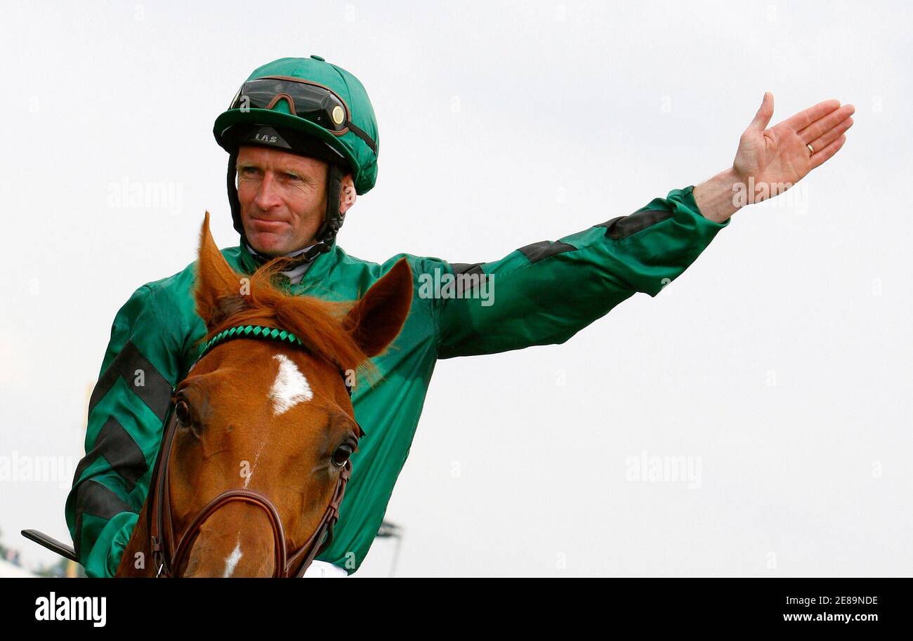 Kevin Manning riding New Approach celebrates after winning the Derby during the Epsom Derby Festival at Epsom Downs in Surrey, southern England, June 7, 2008. REUTERS/Alessia Pierdomenico (BRITAIN) Stock Photo