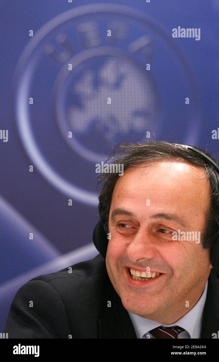 UEFA President Michel Platini smiles during a news conference after an UEFA Executive Committee meeting in Luzerne November 30, 2007. The Champions League final will be moved from its traditional midweek slot and instead be held on Saturday evenings, UEFA announced on Friday. REUTERS/Michael Buholzer (SWITZERLAND) Stock Photo