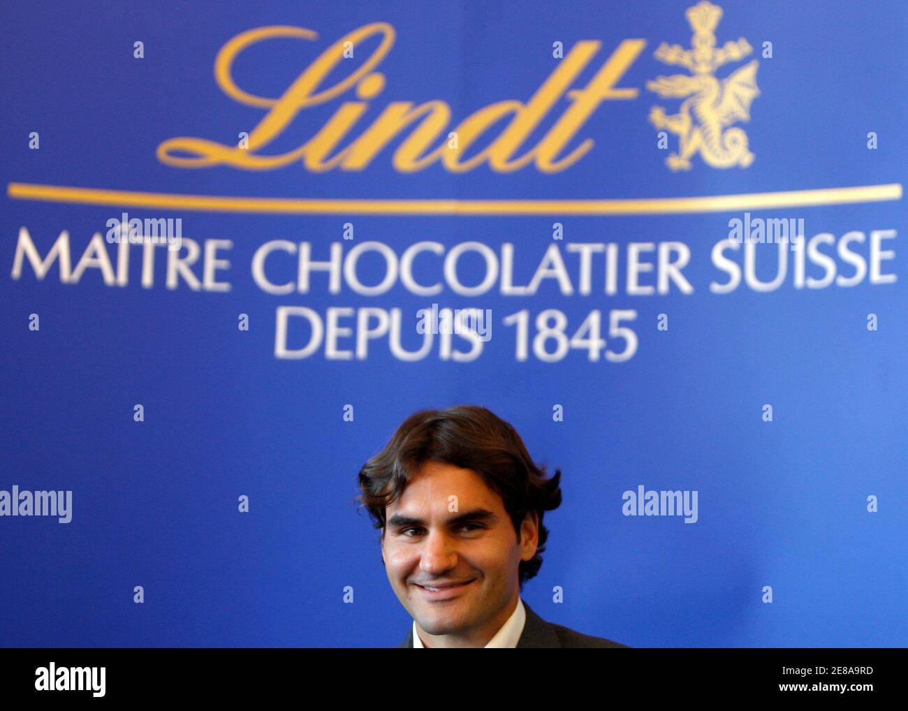 Swiss chocolate maker Lindt & Spruengli new ambassador, Swiss tennis player  Roger Federer, smiles as he attends a press conference on his new  partnership with the chocolate maker in Kilchberg, near Zurich,