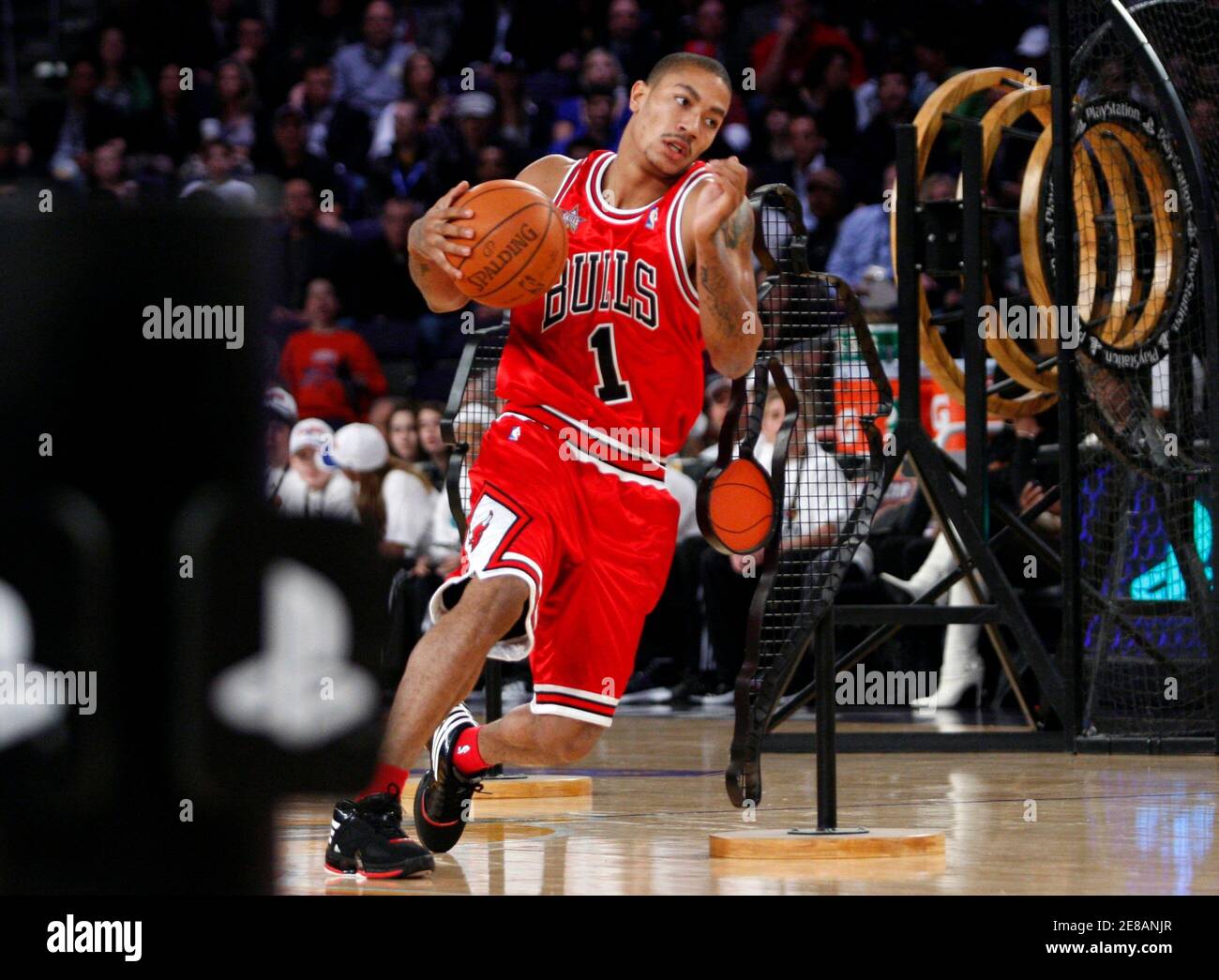 Chicago Bull's Derrick Rose runs through drills in the Skills Competition  at the NBA All-Star basketball weekend in Phoenix, Arizona, February 14,  2009. Rose won the competition. REUTERS/Jessica Rinaldi (UNITED STATES Stock