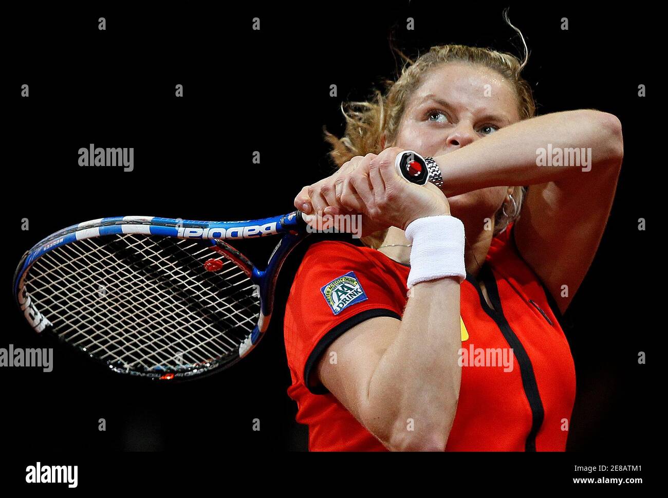 Belgium's Kim Clijsters returns plays against Estonia's Maret Ani during  their Fed Cup World Group play-off tennis match in Hasselt, April 24, 2010.  REUTERS/Yves Herman (BELGIUM - Tags: SPORT TENNIS Stock Photo -