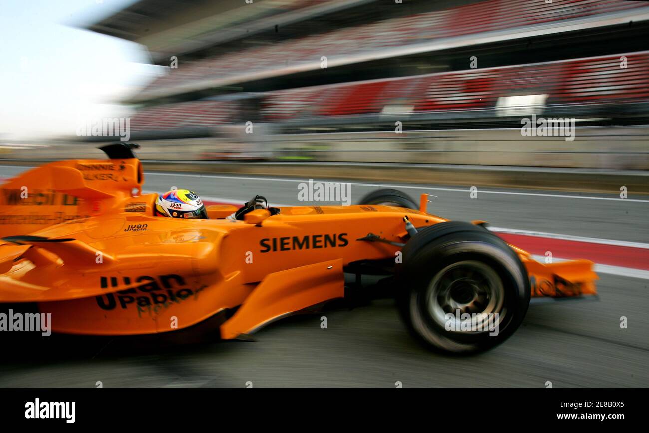 Colombian Formula One Driver Juan Pablo Montoya Drives His New Mclaren Mercedes Mp4 21 Car During Training Session At Montmelo S Racetrack Near Barcelona January 24 06 Some Teams Are Testing Their Cars Until
