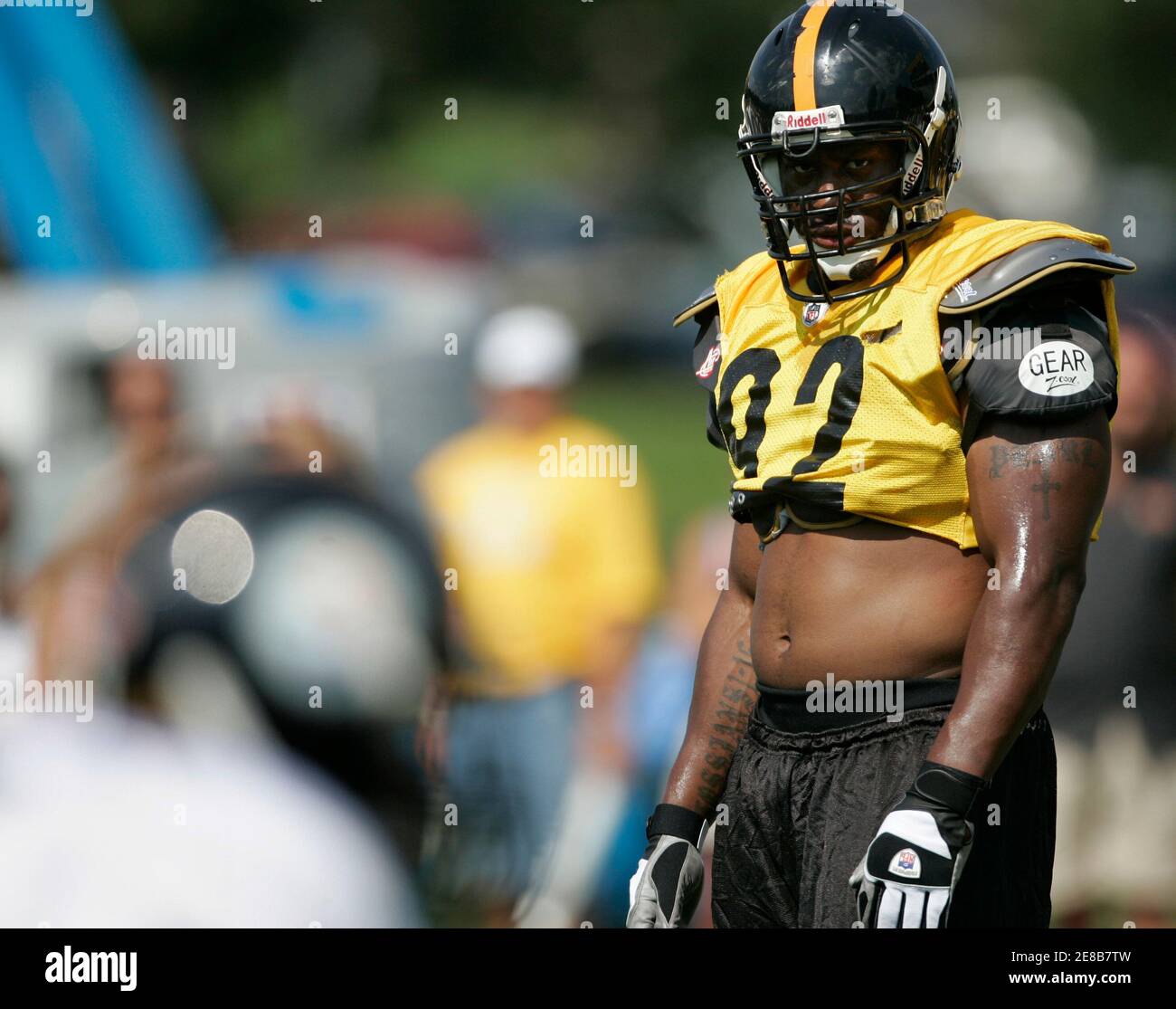 Pittsburgh Steelers linebacker James Harrison waits for his turn for drills  during practice at the team's training camp in Latrobe, Pennsylvania, on  August 3, 2009. REUTERS/ Jason Cohn (UNITED STATES SPORT FOOTBALL