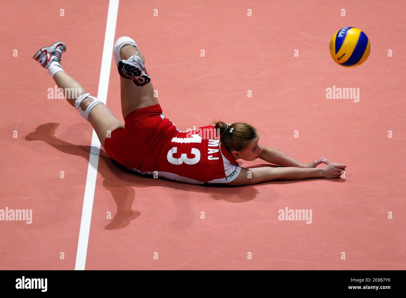 Paulina Maj of Poland falls on the court during the team's FIVB World Grand Prix women's volleyball match against the Dominican Republic in Hong Kong August 16, 2009.       REUTERS/Tyrone Siu    (CHINA SPORT VOLLEYBALL) Stock Photo