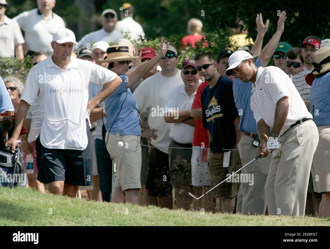 Tiger Woods chips onto the eighth green during the third round of play at The Players Championship golf tournament in Ponte Vedra Beach, Florida May 12, 2007. REUTERS/Rick Fowler (UNITED STATES) Stock Photo