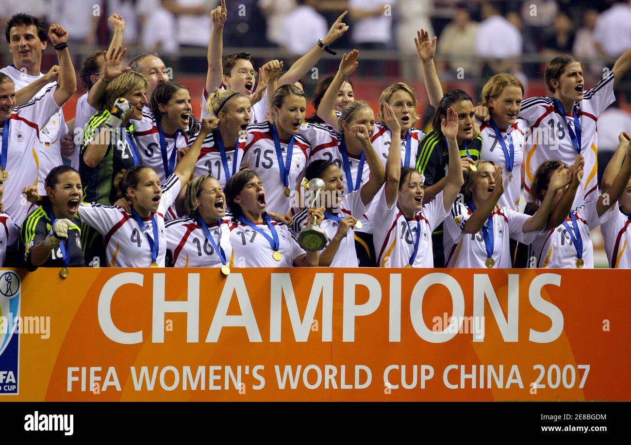Germany&#39;s team celebrates after defeating Brazil in the final of the 2007  FIFA Women&#39;s World Cup soccer tournament in Shanghai in this file picture  taken September 30, 2007. Women&#39;s soccer in Germany