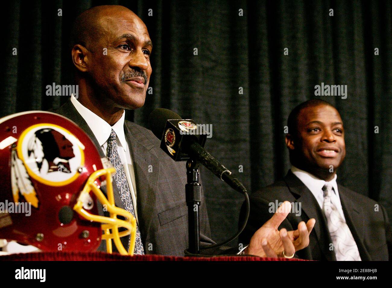 Former Washington Redskins players Darrell Green (R) and Art Monk (L) smile during a news conference at the team facility in Ashburn, Virginia on February 5, 2008. Both players will be inducted into the NFL Pro Football Hall of Fame in Canton, Ohio on August 2, 2008.      REUTERS/Gary Cameron   (UNITED STATES) Stock Photo