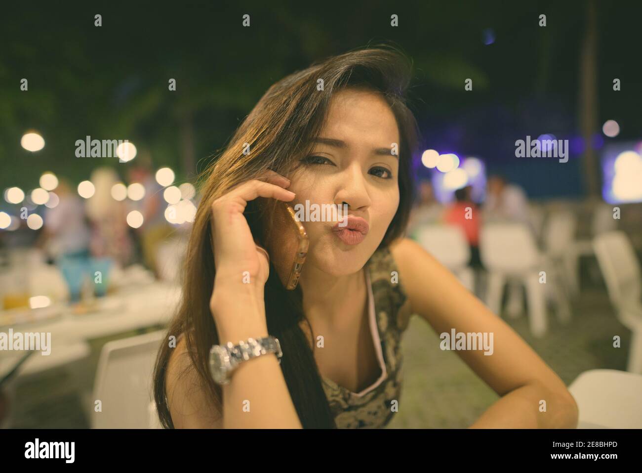 Asian woman talking hi-res stock photography and images - Alamy