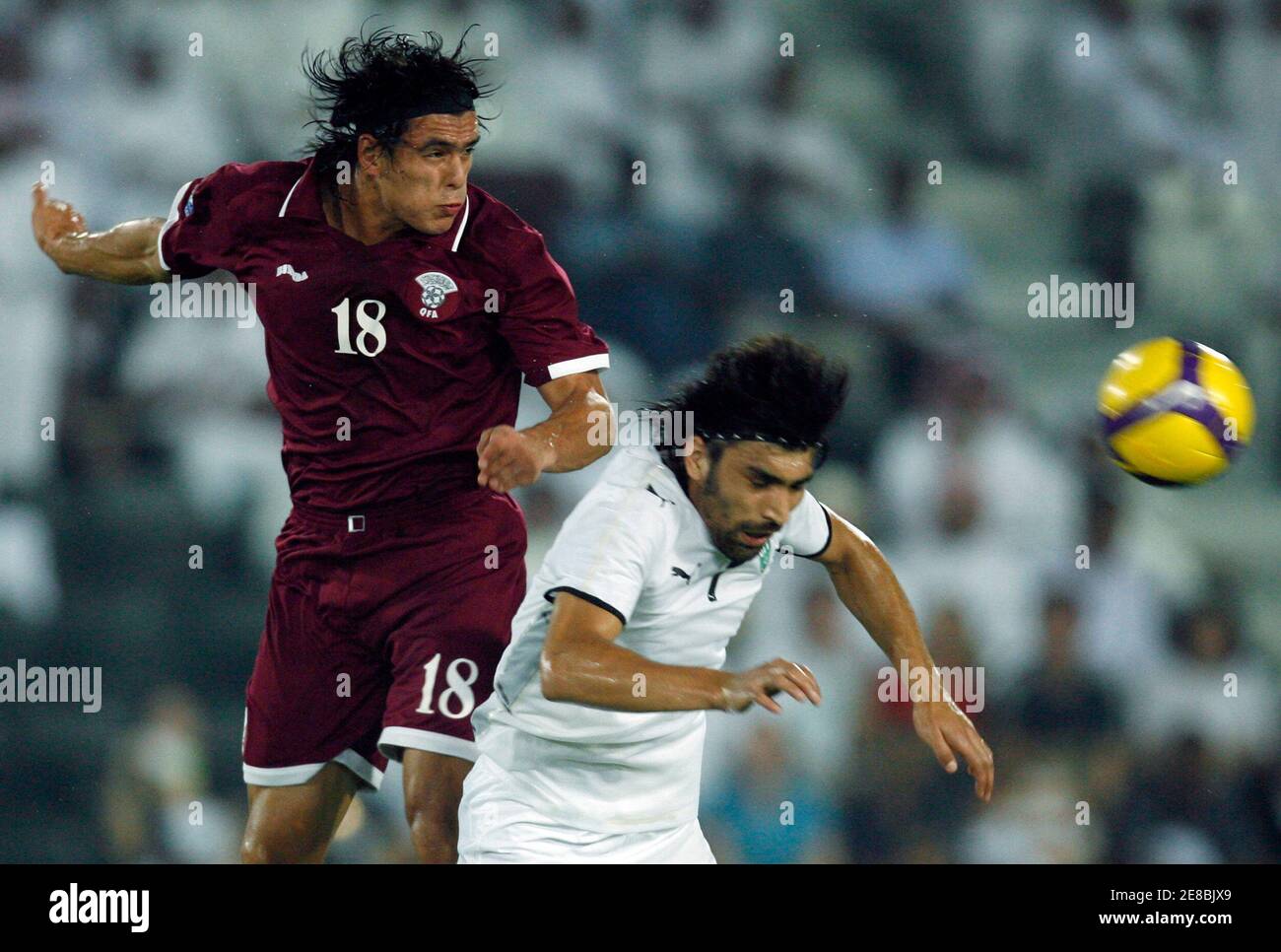 Uzbekistan S Haydarov Azizbek R Fights For The Ball With Qatar S Sebastian Soria During Their World Cup 10 Asian Qualifying Soccer Match In Doha September 6 08 Reuters Fadi Al Assaad Qatar Stock Photo Alamy