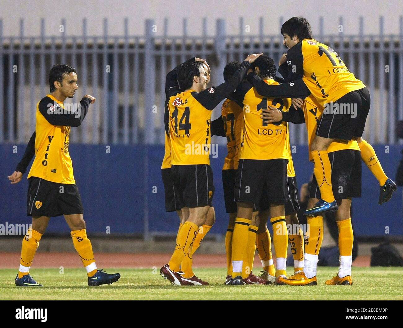 Qadsia's players celebrate after scoring against Salmiya during their  Kuwaiti Premier League soccer match in Kuwait City February 8, 2009.  REUTERS/Tariq AlAli (KUWAIT Stock Photo - Alamy