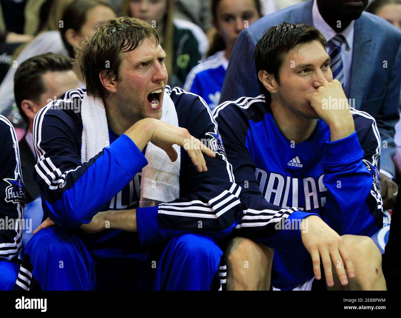 dallas-mavericks-forward-dirk-nowitzki-l-yells-as-he-sits-with-teammate-forward-eduardo-najera-while-playing-the-orlando-magic-during-second-half-nba-basketball-action-in-orlando-florida-february-19-2010