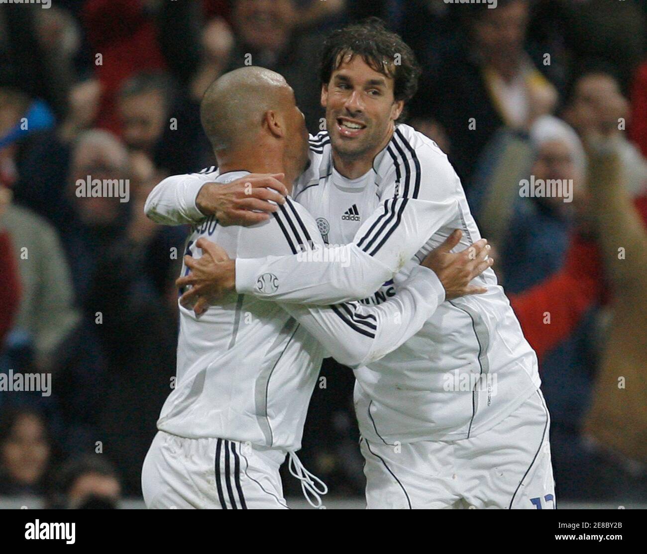 Real Madrid's Ronaldo (L) is congratulated by his team mate Ruud Van  Nistelrooy after scoring against Athletic Bilbao during their Spanish First  Division soccer match at the Santiago Bernabeu stadium in Madrid