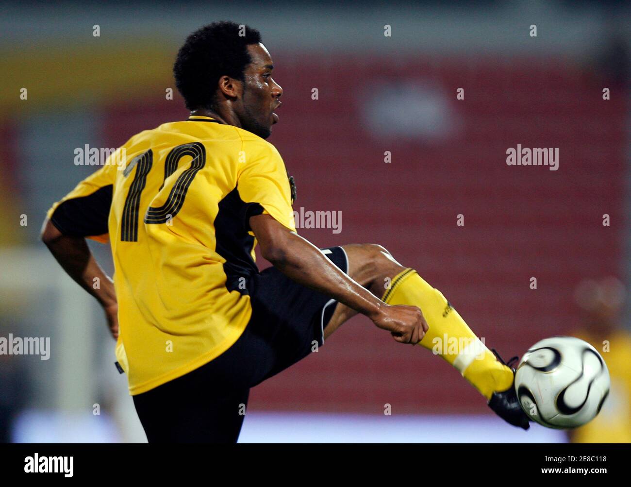 Qatar Club S Jay Jay Okocha Of Nigeria Controls The Ball Against Al Sadd During The Quarter Final Match Of The Qatari Amir Cup Soccer Tournament In Doha May 13 07 Euters Fadi Al Assaad Qatar Stock Photo Qatar Club S Jay Jay Okocha Of Nigeria Controls The Ball Against Al Sadd During The Quarter Final Match Of The Qatari Amir Cup Soccer Tournament In Doha May 13 07 Euters Fadi Al Assaad Qatar Stock Photo