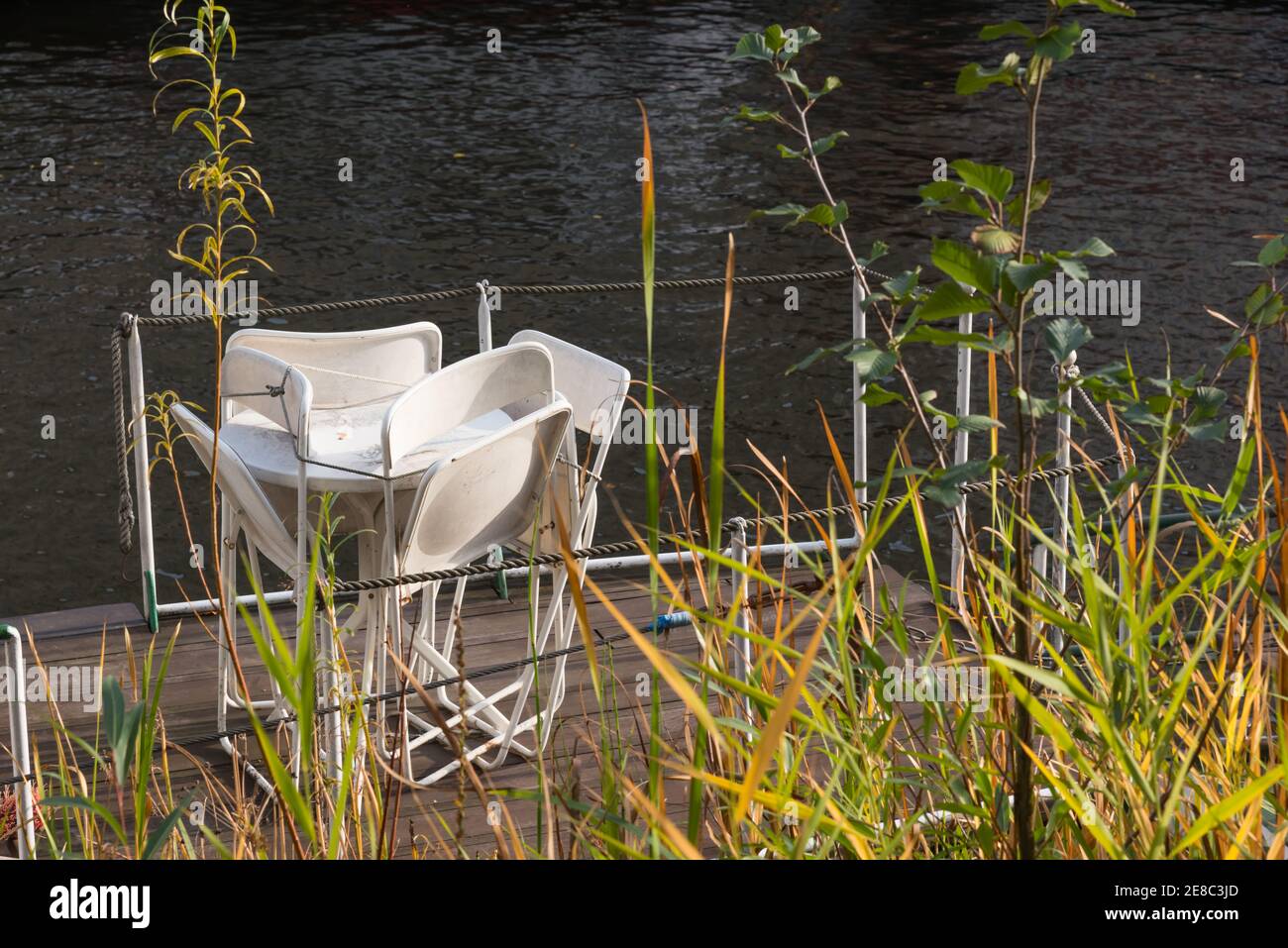 Folded up tables and chairs hi-res stock photography and images - Alamy