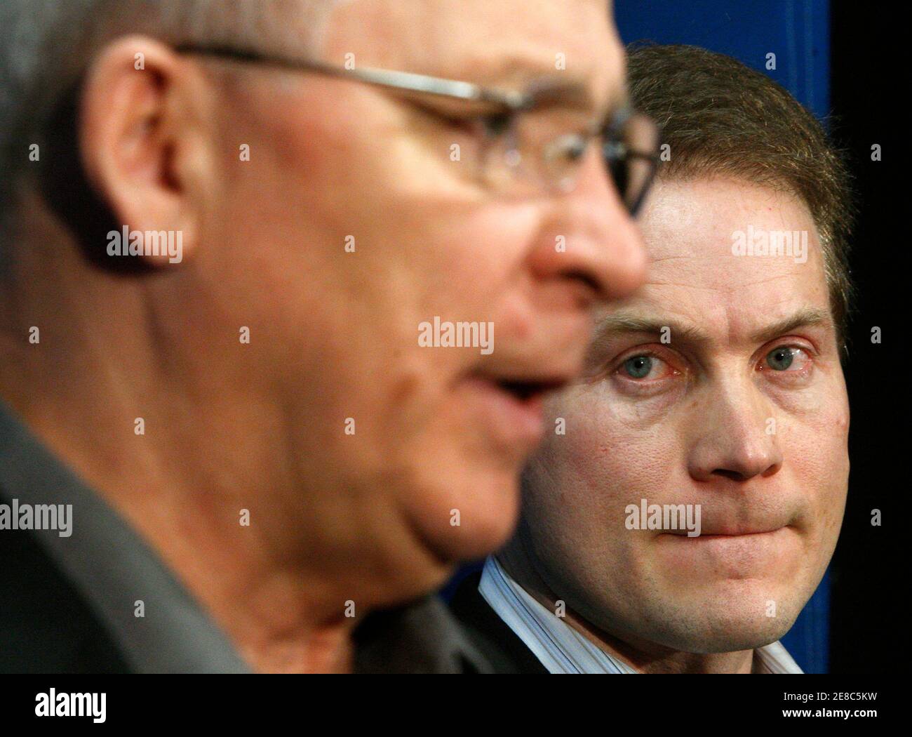NHL ice hockey team Ottawa Senators' new head coach Cory Clouston (R) listens to general manager Bryan Murray during a news conference in Ottawa February 2, 2009. Clouston replaced Craig Hartsburg, who was fired after less than eight months in the job.       REUTERS/Chris Wattie       (CANADA) Stock Photo