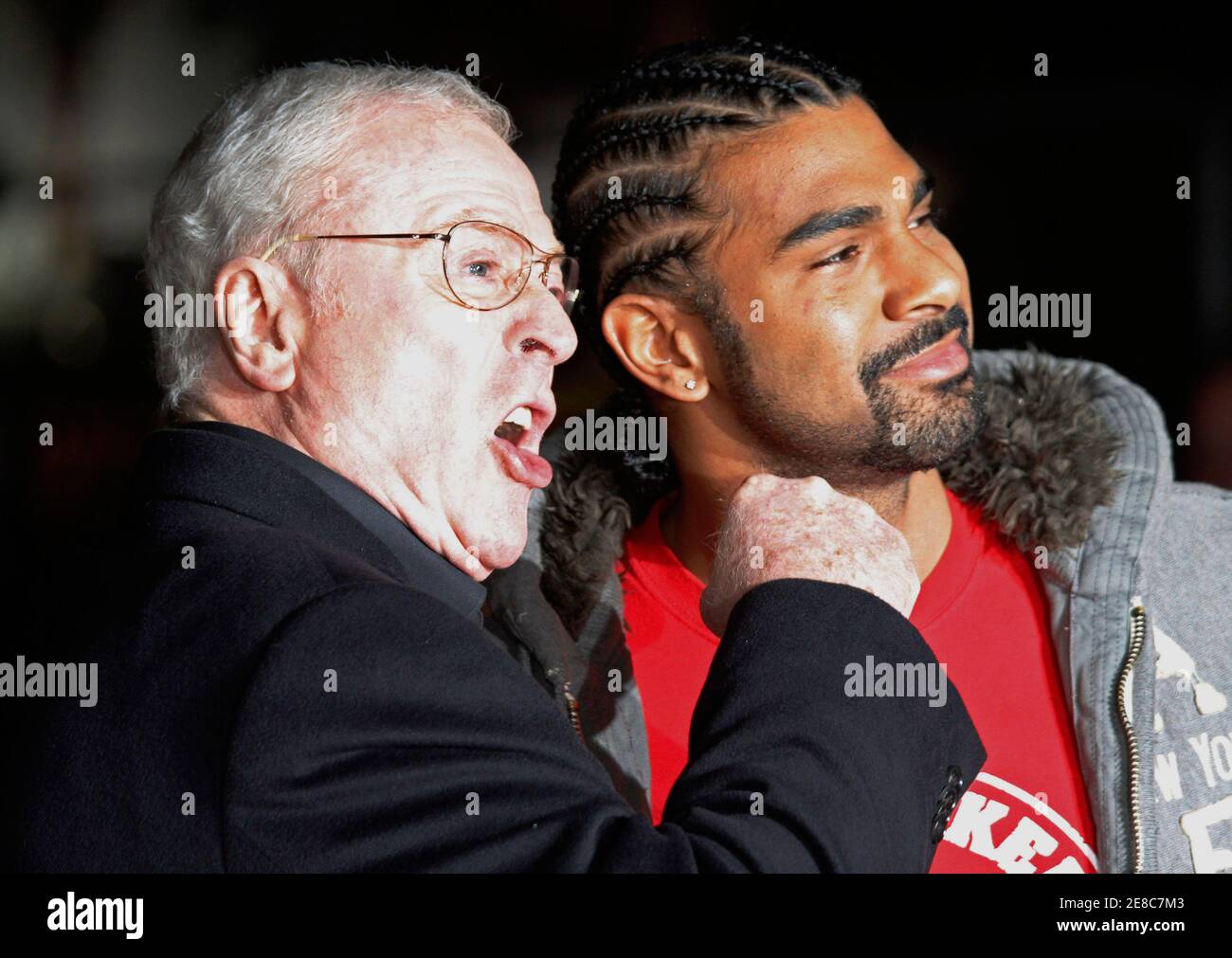 titel teenagere Standard British actor Michael Caine (L) jokes with new WBA heavyweight boxing world  champion David Haye as they arrive for the European premiere of the movie  "Harry Brown" in London, November 10, 2009.